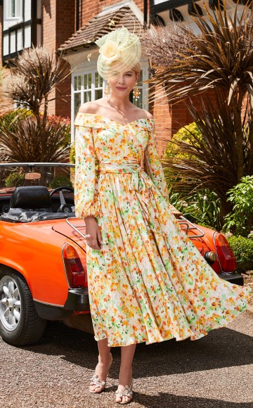 Veni Infantino 29664 - Floral print  Chiffon dress with Off the shoulder neckline & sleeves Mother of the Bride/groom dresses now on Sale at Occasions at Blessings Loyal Parade, Mill Rise, Westdene, Brighton. BN1 5GG T: 01273 505766 E: info@blessingsbridal.co.uk
