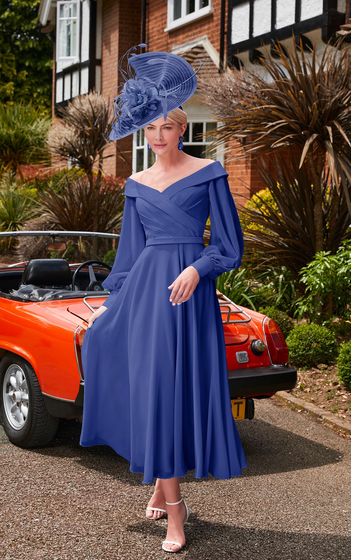 Veni Infantino 29677 - size 22 - Veni Infantino 29677 - Royal Blue Chiffon dress with Off the shoulder neckline & sleeves Mother of the Bride & groom dresses Now on Sale at Occasions at Blessings Loyal Parade, Mill Rise, Westdene, Brighton. BN1 5GG T: 01273 505766 E: info@blessingsbridal.co.uk