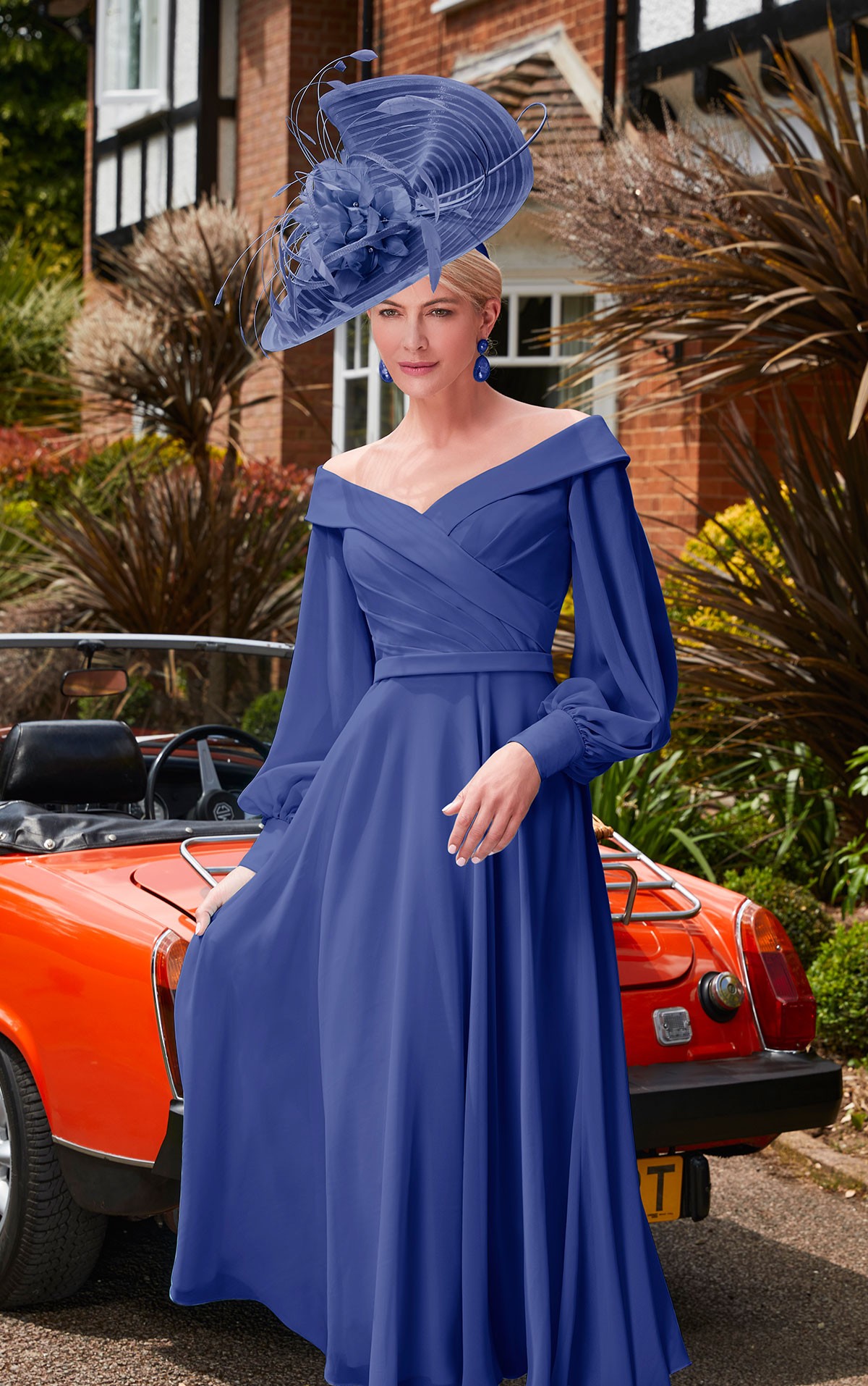 Veni Infantino 29677 - size 22 - Veni Infantino 29677 - Royal Blue Chiffon dress with Off the shoulder neck & sleeves Mother of the Bride /groom dresses on Sale at Occasions at Blessings Loyal Parade, Mill Rise, Westdene, Brighton. BN1 5GG T: 01273 505766 E: info@blessingsbridal.co.uk