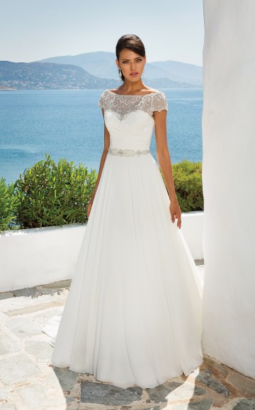 Justin Alexander 8799, Chiffon Grecian Style A-line Wedding Dress with Beaded Off the Shoulder Neckline available at Blessings Bridal Boutique, Brighton, East Sussex, BN1 5GG. Telephone: 01273 505766
