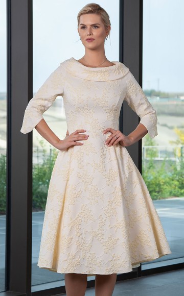 Lizabella 2002,  Embroidered look fabric  A-line  dress with Bateau neckline & 3/4 length sleeves. Mother of the Bride & Mother of the Groom outfits at  Occasions by Blessings Ladies Occasion Wear Shop  - 1 Loyal Parade, Mill Rise, Westdene, Brighton. East Sussex. BN1 5GG.