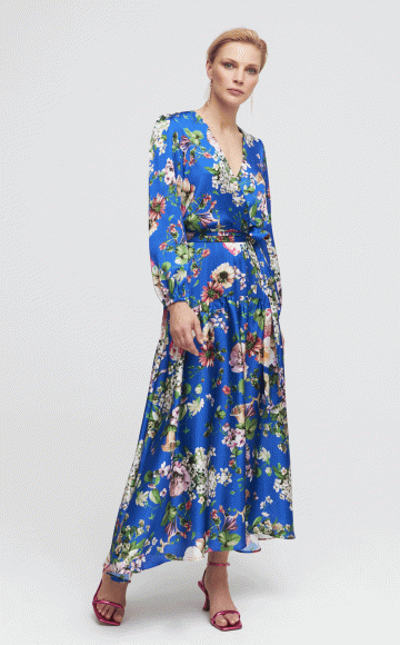 Luis Civit D808, Stunning Royal blue multi Floral print satin chiffon dress with V neckline & asymmetric hem & long sleeves. Blessings Bridal & Occasion Wear stockist Brighton, East Sussex. BN1 5GG Telephone: 01273 505766 Email: info@blessingsbridal.co.uk