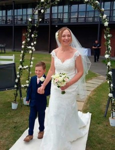 Gemma wore Stella York 6249 a Fit and Flare wedding dress with portrait neckline from Blessings Bridal 3 Loyal Parade, Mill Rise, Westdene, Brighton. BN1 5GG