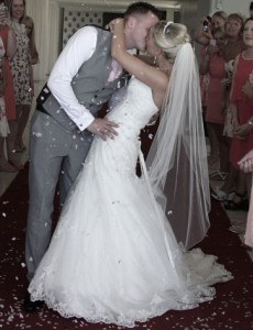 Jodie wore a fully beaded, strapless wedding dress by Stella York